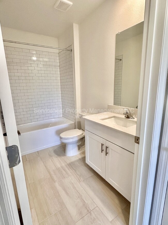 Building Photo - 8406 Blue Wave Ln E