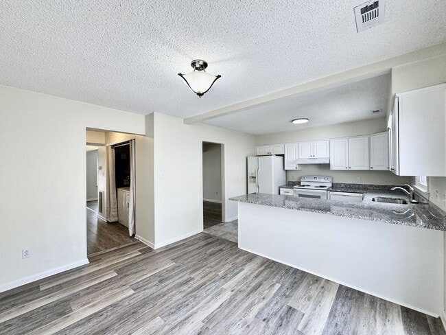 Building Photo - READY NOW!! Fenced Patio - Pet Friendly - Over 1,500 Square Feet!!