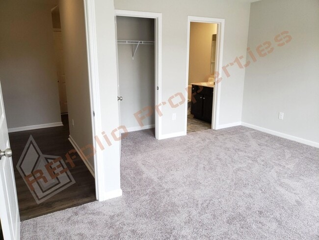 Building Photo - Beautiful Luxury 3 Story 3 Bedroom Townhome with 1st Floor Guest Suite, Attached 2 Car Garage, Co...
