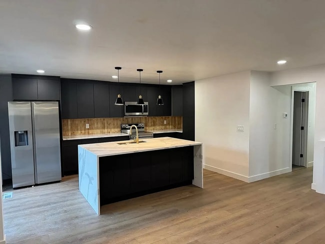 Building Photo - This newly remodeled home