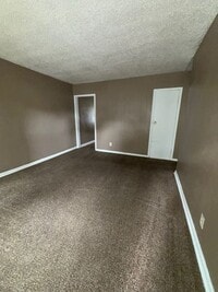 Building Photo - Charming 2-Bed End Unit in Quiet Quadplex-...