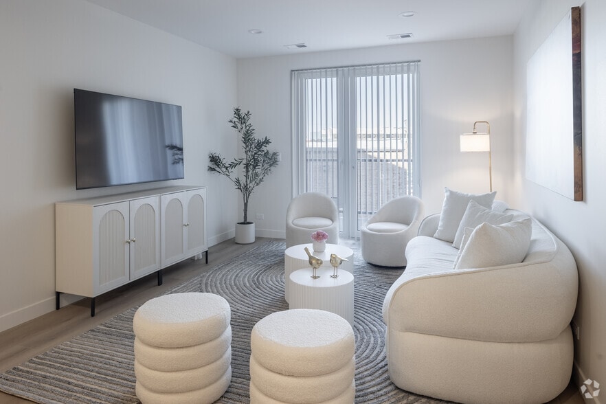 2Br, 2BA - 1,461SF - Living Room - The Grandstone by Nea Maya