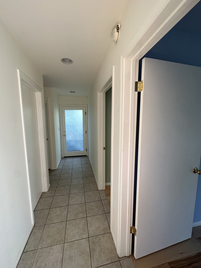 Downstairs hall showing back door - 19876 Observation Dr