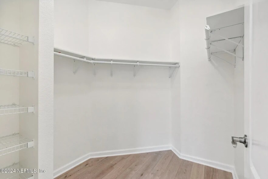 Primary Walk-in Closet - 8601 Beach Blvd