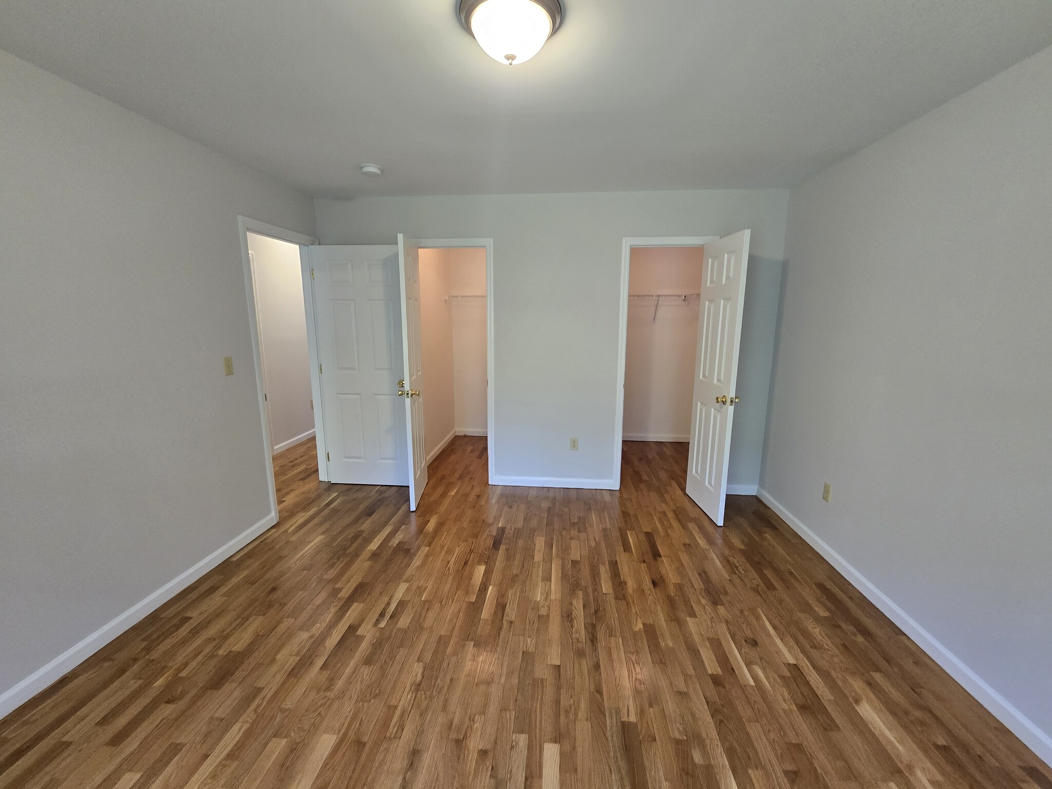 Primary Bedroom with 2 walk in closets - 13 Autumn Leaf Ct