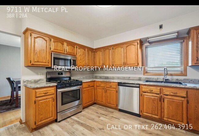 Building Photo - 9711 W Metcalf Pl
