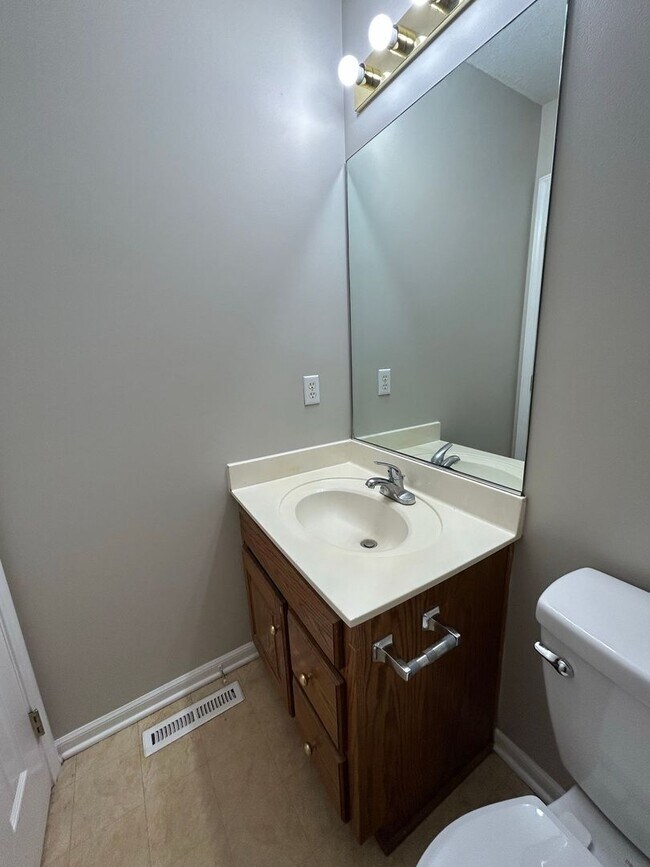 Building Photo - 3-Bedroom Duplex with Open Living Area & Private Owner’s Suite