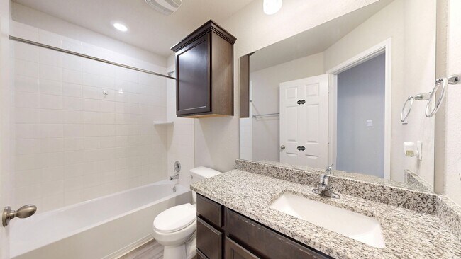Building Photo - Discover this spacious 4-bedroom, 2-bath home with 3 CAR GARAGE!!!