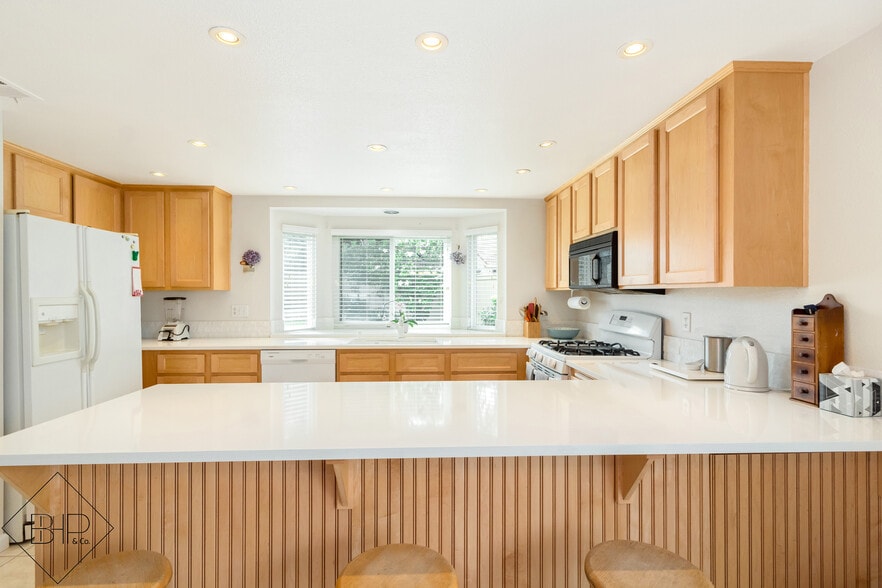 Kitchen Looking Over Quartz Countertop - 1987 Willow Ridge Dr