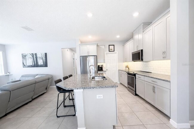 Building Photo - 4054 Pindo Palm Ln