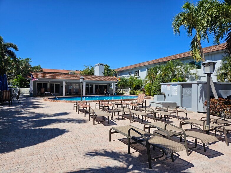 loads of tables and chairs - 669 W Oakland Park Blvd