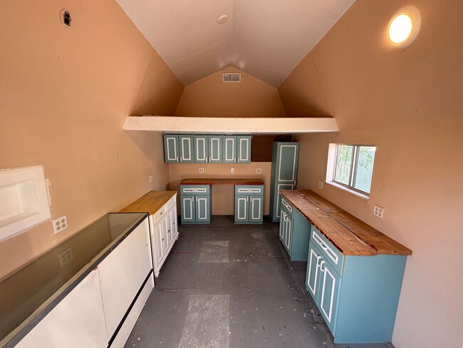 Building Photo - This inviting single-story home boasts a s...