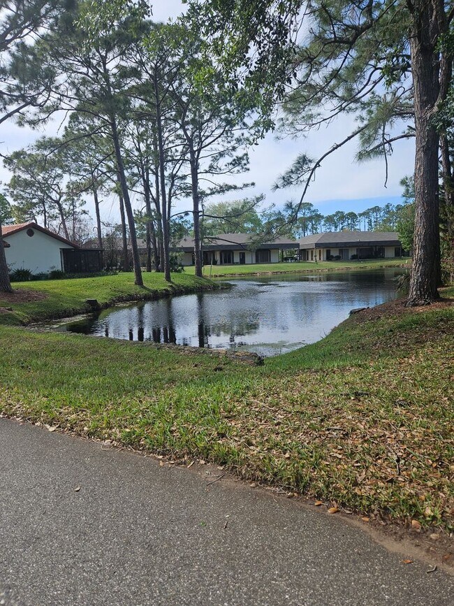 Building Photo - 2 BEDROOM 2 BATH HOME IN  PELICAN BAY GATED COMMUNITY