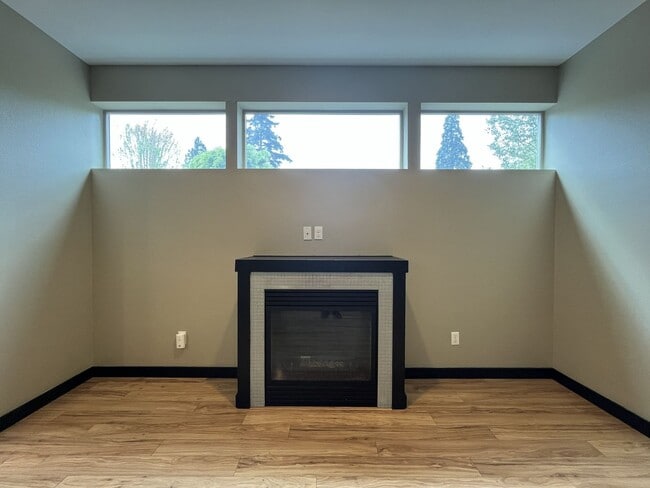 Building Photo - Charming 3 Bedroom, 2.5 Bathroom Home with Large Living Room, Tall Windows, Island Kitchen, and A...