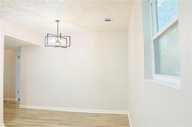 Building Photo - 4411 Flakes Mill Rd