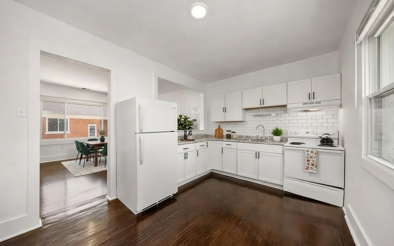 A sleek, updated kitchen. Image is virtually staged - 1975 Gladstone St