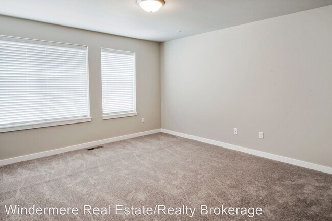 Building Photo - 4 br, 2.5 bath House - 8419 63rd St NE