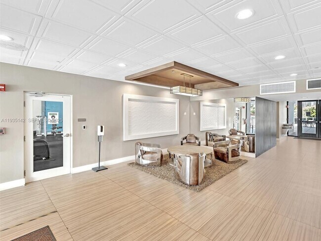 Building Photo - 3675 N Country Club Dr