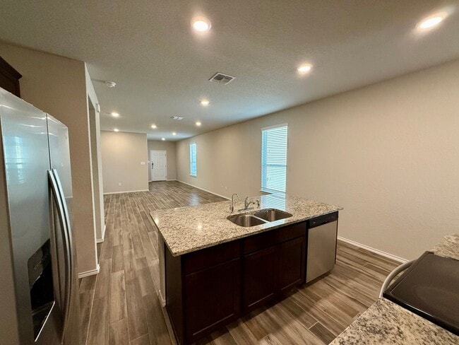 Building Photo - Lovely 1-story 4 bedroom/2 bath home is an...