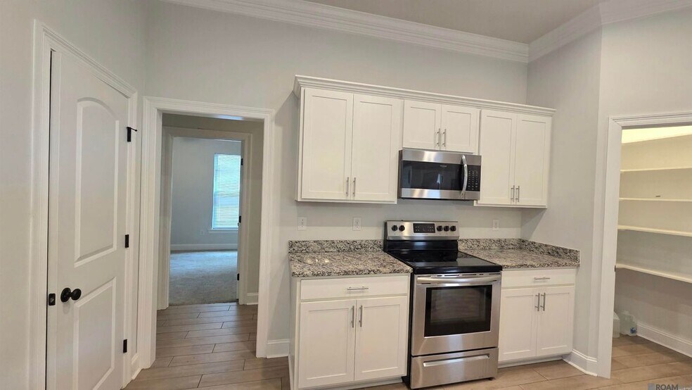 Building Photo - 7004 Spring Gardens Dr