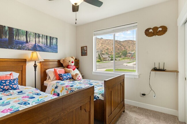 Building Photo - 3-bedroom, 2-bathroom home featuring an op...
