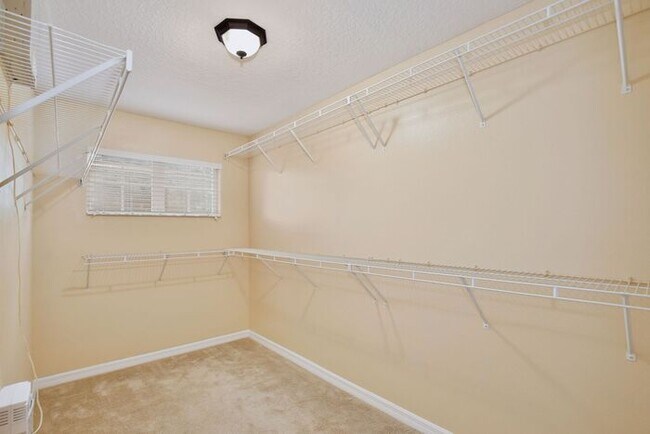 Building Photo - Luxury 3BR/3BA Townhome with 2-Car Garage in Gated Greystone – Sanford