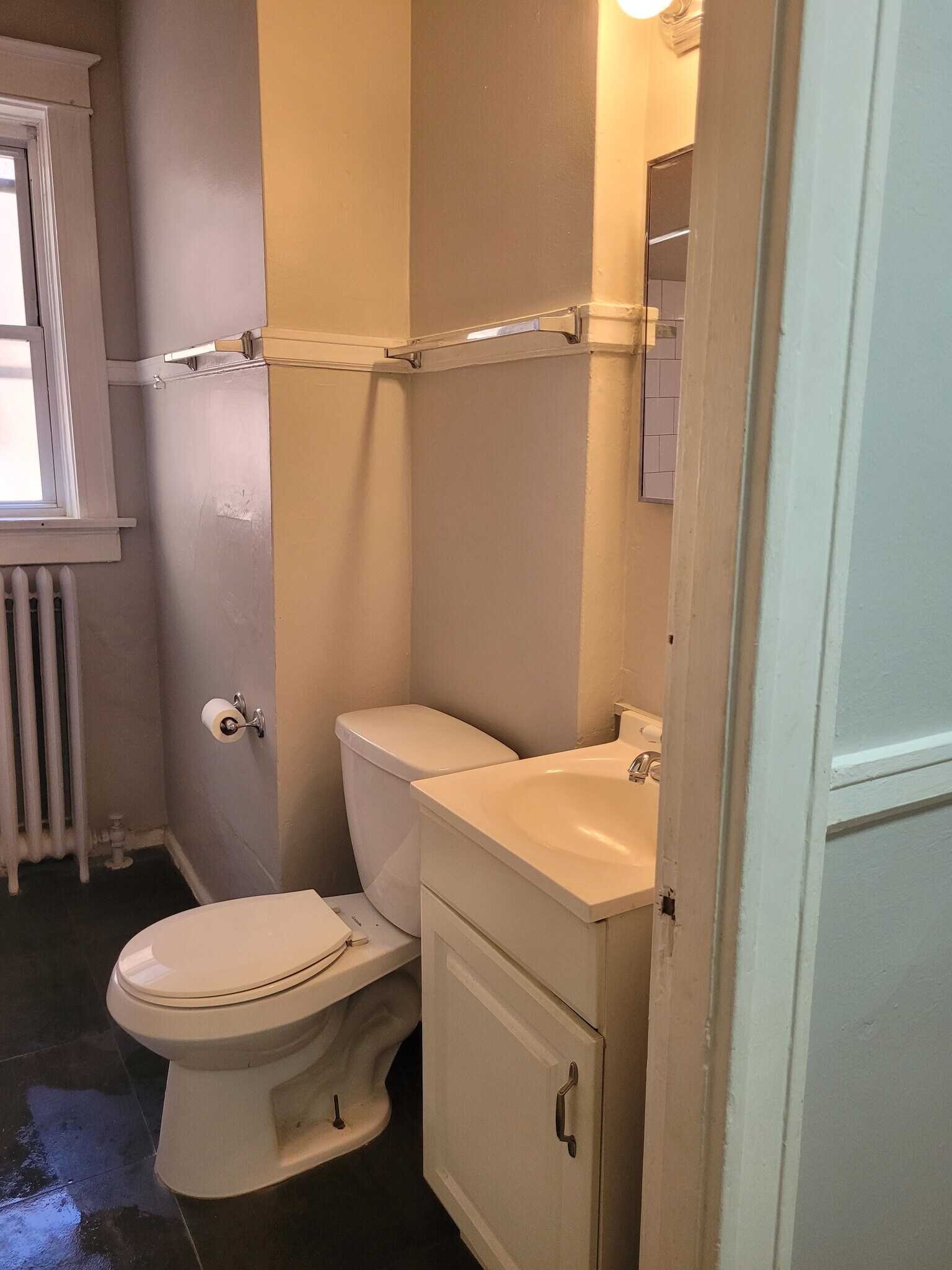 The bathroom is located between the kitchen and the bedroom. - 2055 Alfred Ave