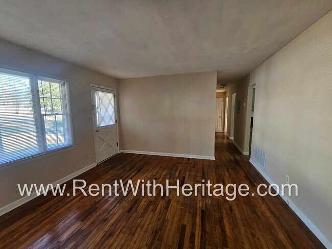 Building Photo - Great Brick Ranch / Harwood Floors / Huge Shop or Extra Storage / No Garage / Great Private Back ...