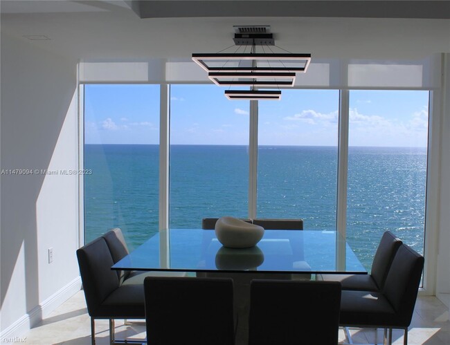 Building Photo - 2 br, 2.5 bath Condo - 10275 Collins Ave A...