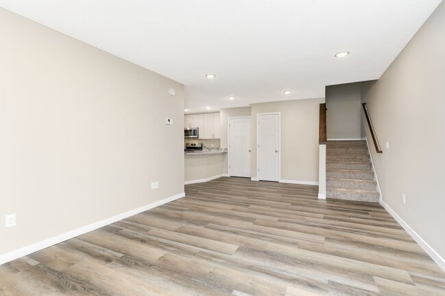 Building Photo - Otsego Townhome for RENT 3bd3ba2gar INTERIOR UNIT available May 01