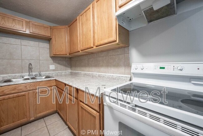 Building Photo - 6260 E 11th St