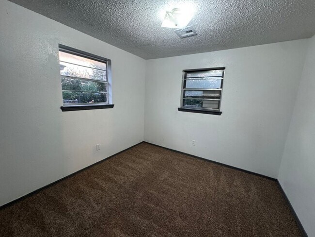Building Photo - 3 bed one bath all new inside ready for mo...