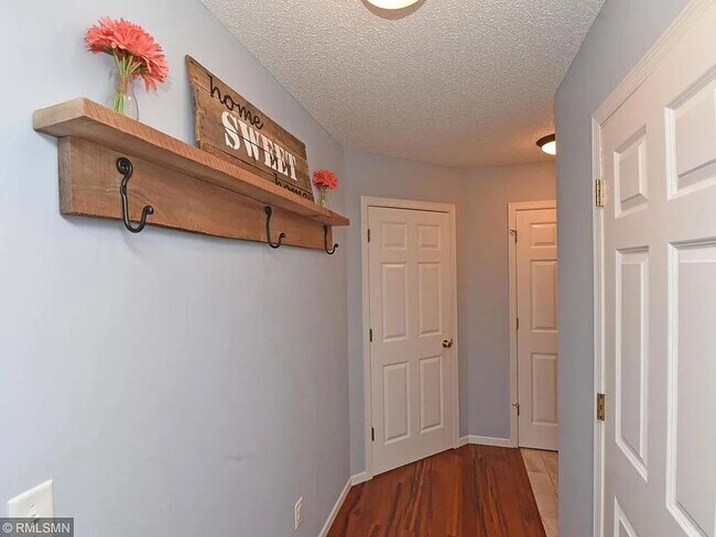 Building Photo - 3 Bedrooms | Loft | Upper-Level Laundry | 3-Sided Fireplace | Woodbury