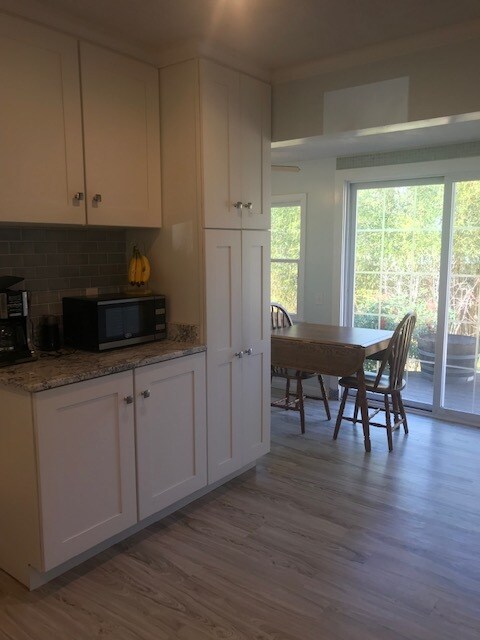 Pantry with pull out shelves and area for table leading out to the deck - 117 Monte Vista Ave