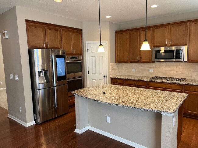 Building Photo - Spacious Corner-Lot Gem in South Denver Metro