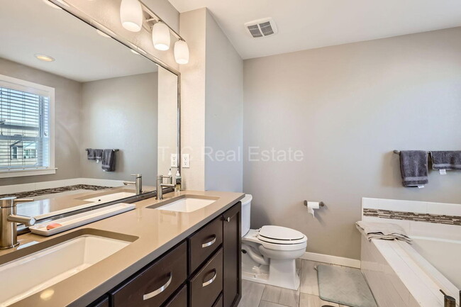 Building Photo - 9046 E 50th Dr