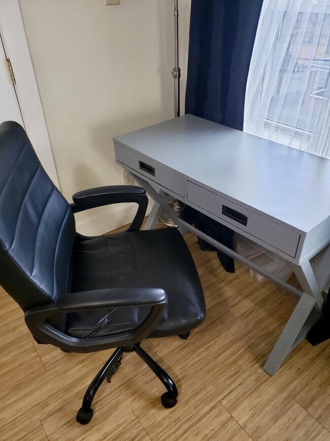 desk and chair - 1035 Chislett St