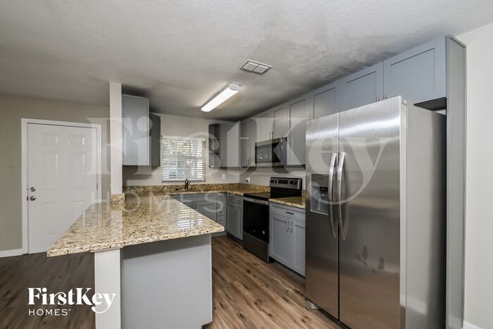 Building Photo - 7610 S Sherrill St