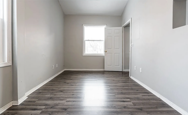 Building Photo - A Charming One-Bedroom with a Yard You’ll Love