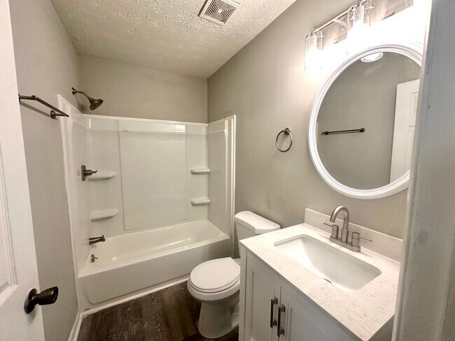 Building Photo - Totally Renovated!  Everything New!  Convenient to Everything!  Pet Friendly!