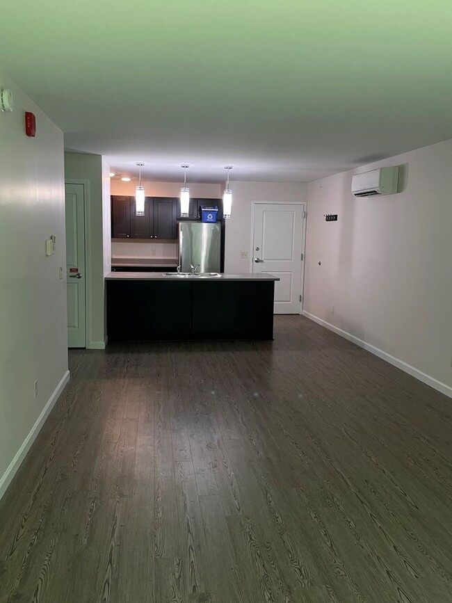 Building Photo - One Bedroom End Unit