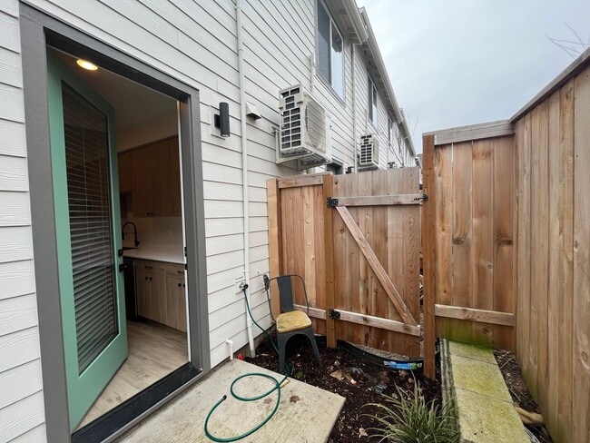 Building Photo - Modern 2-Bed, 1.5-Bath Condo with Custom Kitchen, Private Patio, and Prime Location