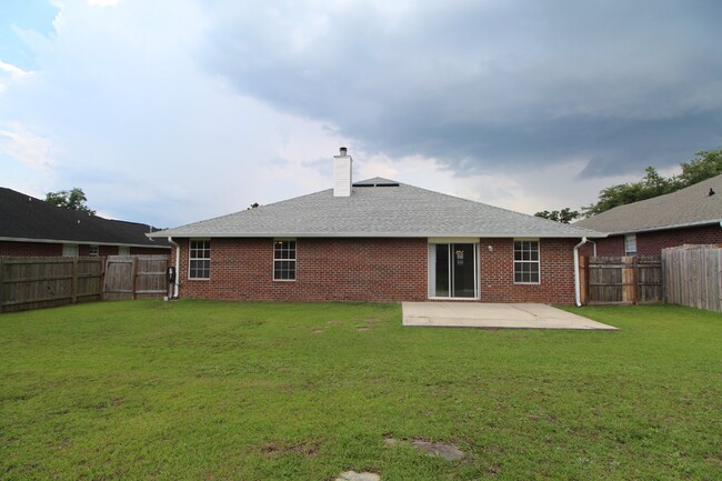 Building Photo - Executive 3-Bedroom Brick Home with Florid...