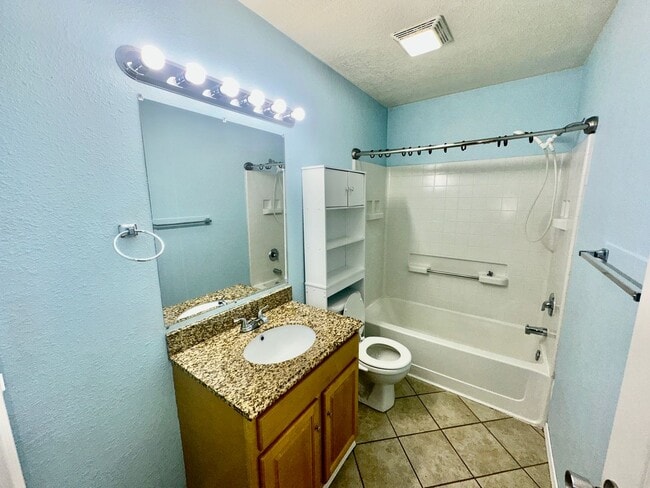 Building Photo - Check out the private fenced backyard!