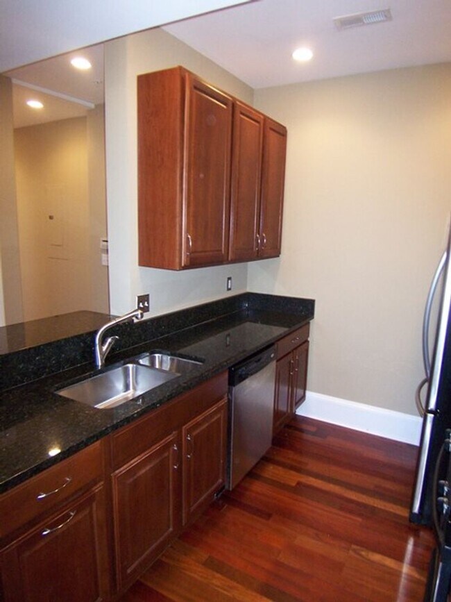 Building Photo - Be Majestic at the Majestic Condominiums! ...