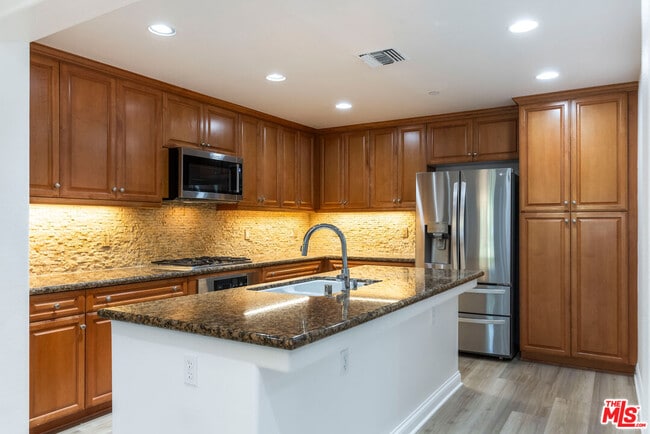 Building Photo - 12975 Agustin Pl