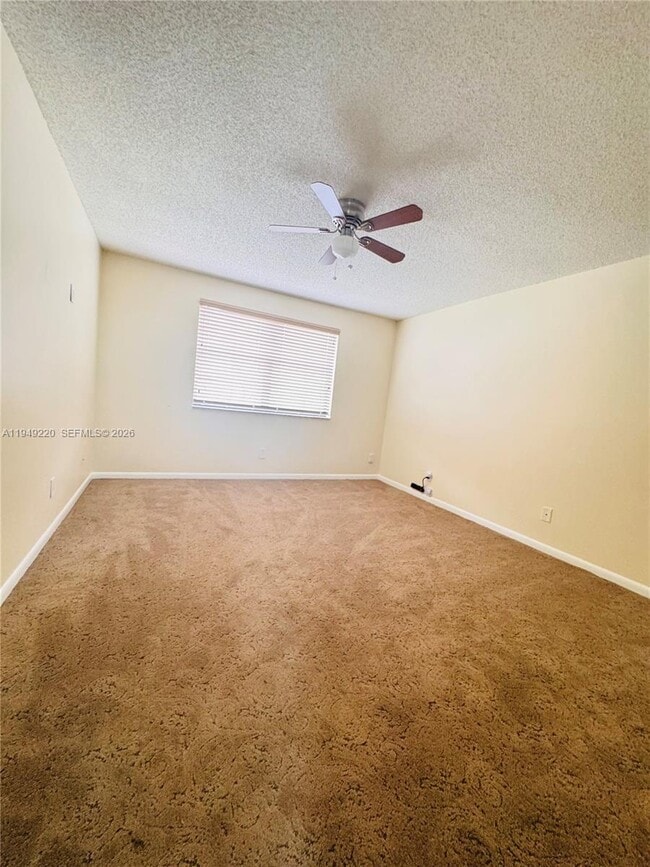 Building Photo - 4950 E Sabal Palm Blvd