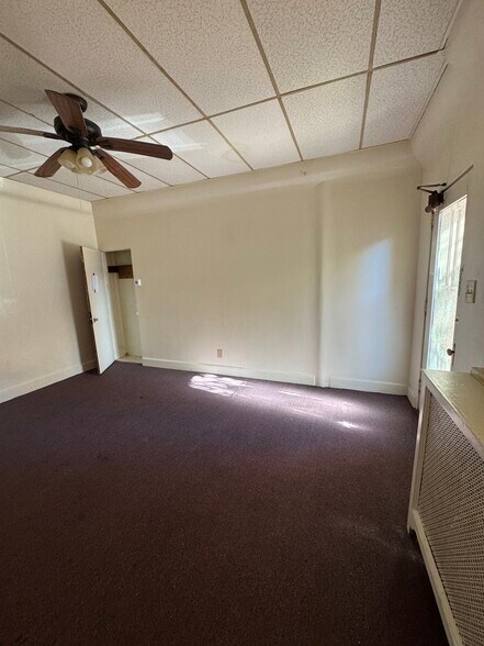 Livingroom with closet & ceiling fan - 151 N Hanover St