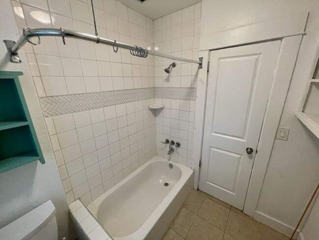 Building Photo - 2-BR Upstairs Unit with Garage in Heart of...