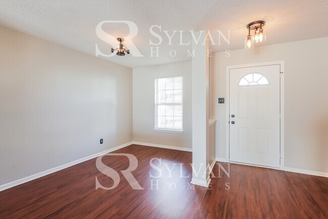 Building Photo - This lovely 4BR, 2.5BA home is move-in ready